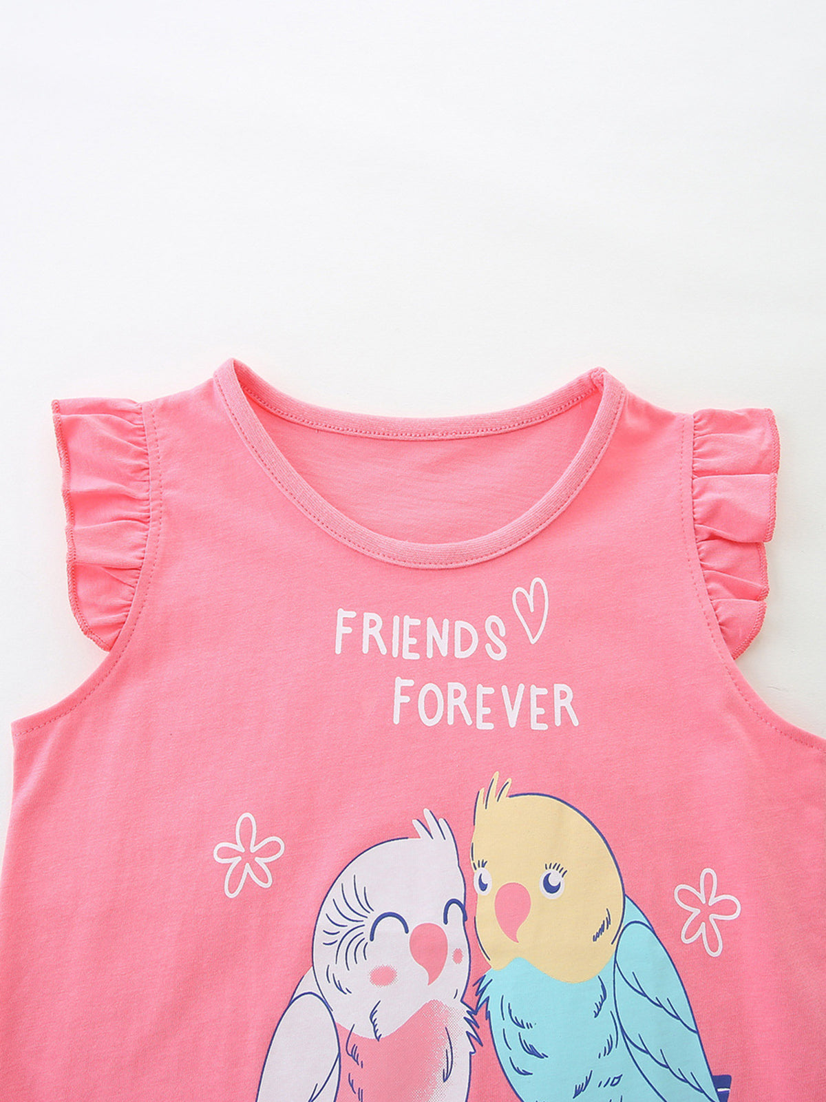 Pink cotton t-shirt with ruffled sleeves and a graphic of two birds with "FRIENDS FOREVER" text.