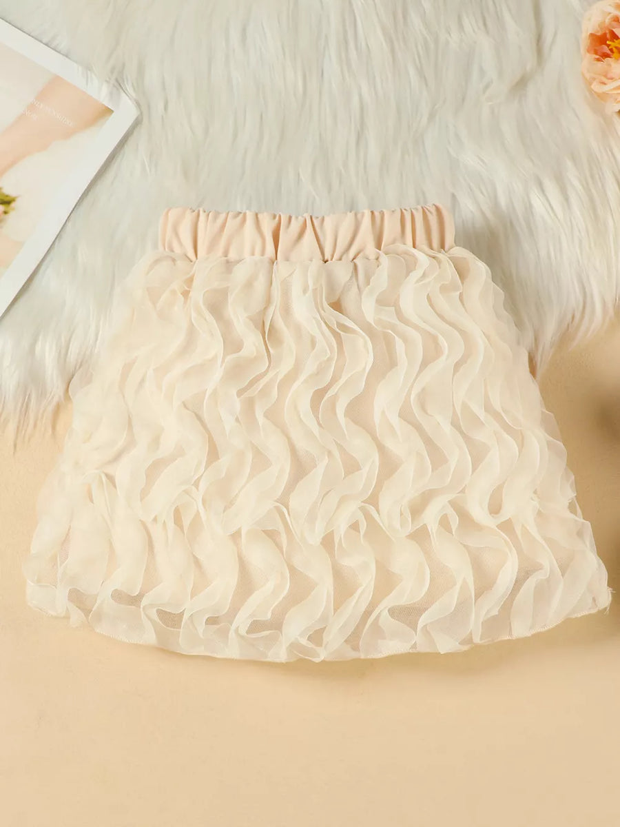 Beige toddler skirt with ruffled texture and elastic waistband