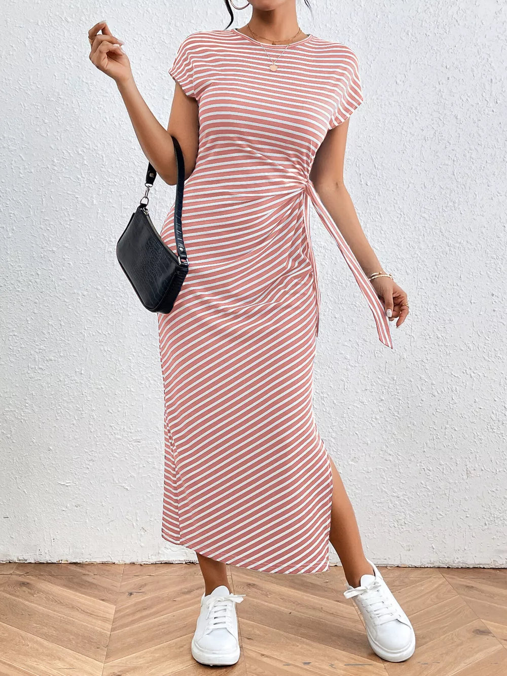 Pink striped midi dress with tie-side detail and leg slit