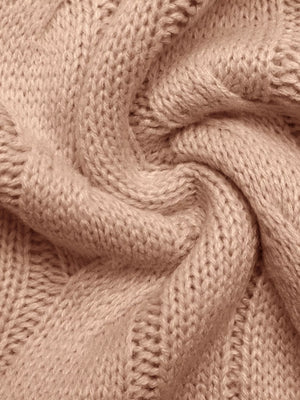 Pink cable knit sweater vest in acrylic fabric, showing texture detail.