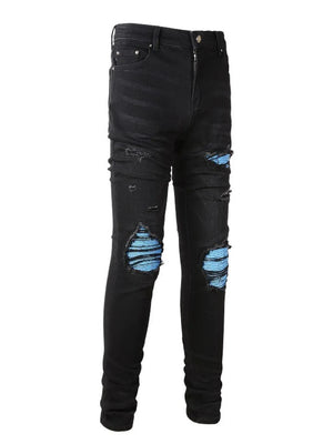 Black distressed denim jeans with ripped knees and azure underlay detail.