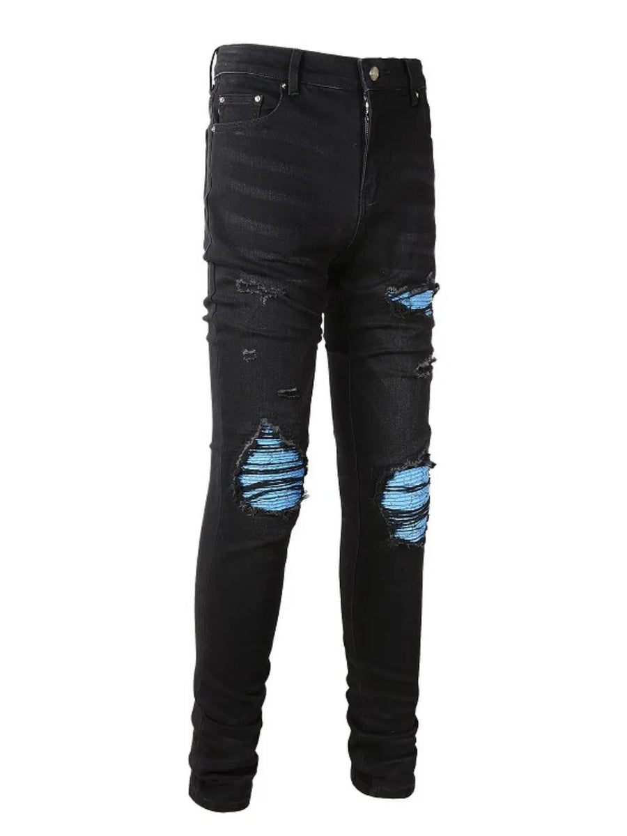 Black distressed denim jeans with ripped knees and azure underlay detail.