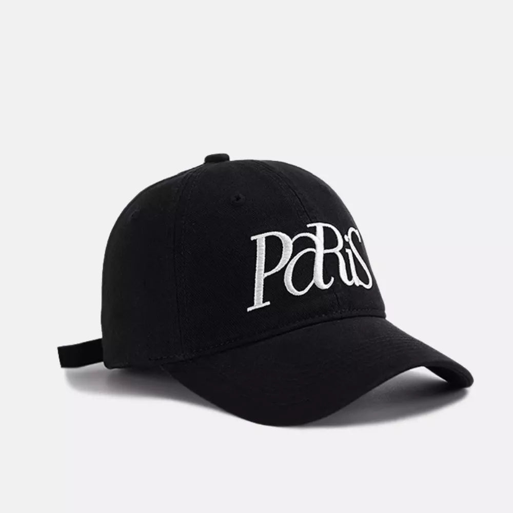 Black baseball cap with white embroidered Paris text