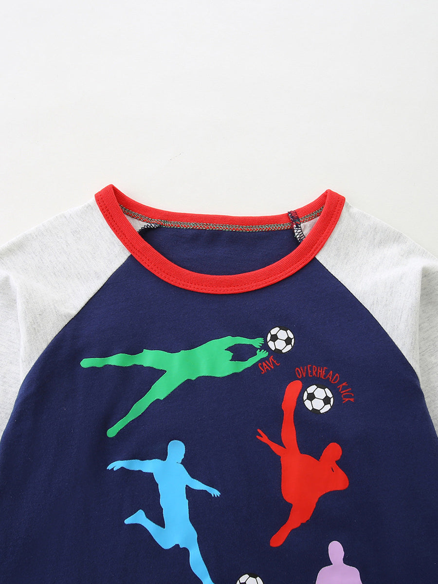 Baby long sleeve tee with colorful soccer players graphic and red trim.