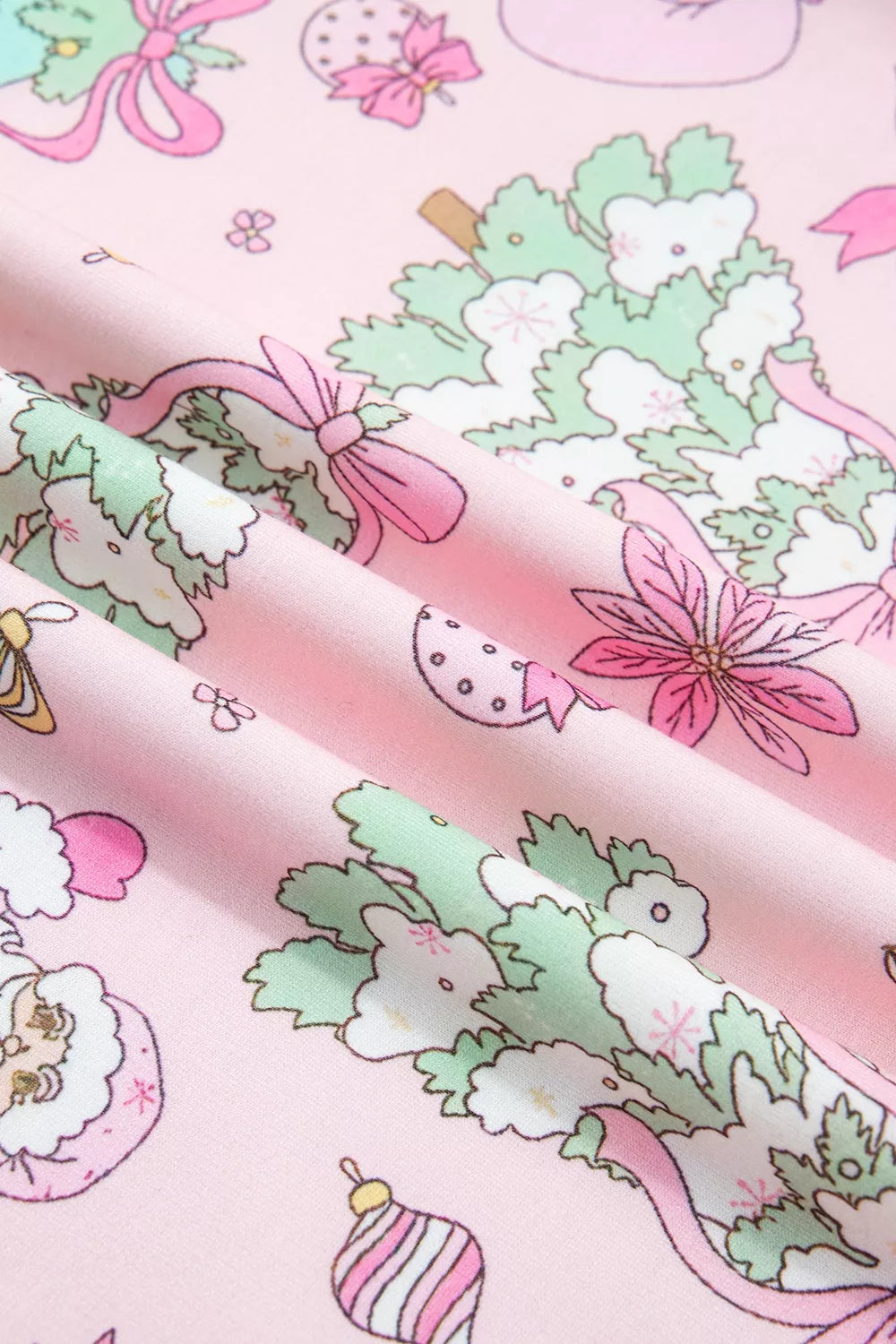 pink pajama set with pullover and Christmas print