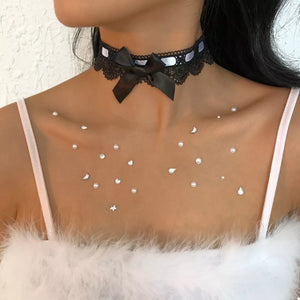 Black choker featuring lace trim and floral