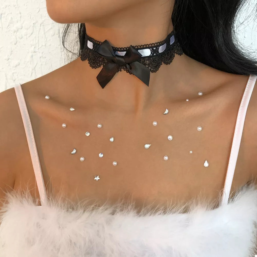 Black choker featuring lace trim and floral