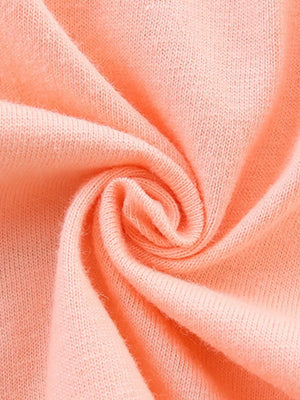 Peach cotton toddler undershirt with ruffle sleeve detail