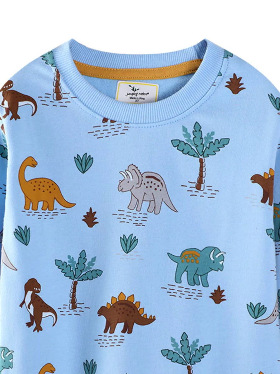 Light blue cotton blend sweatshirt with playful dinosaur print and palm trees.