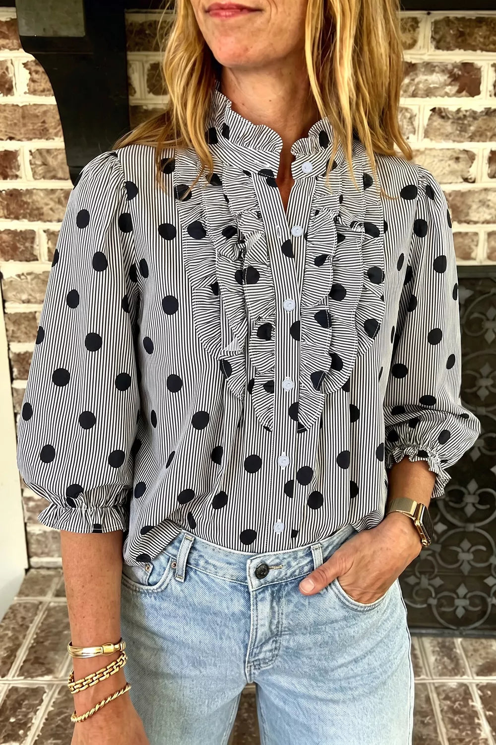 Black blouse with hip-length and button-front