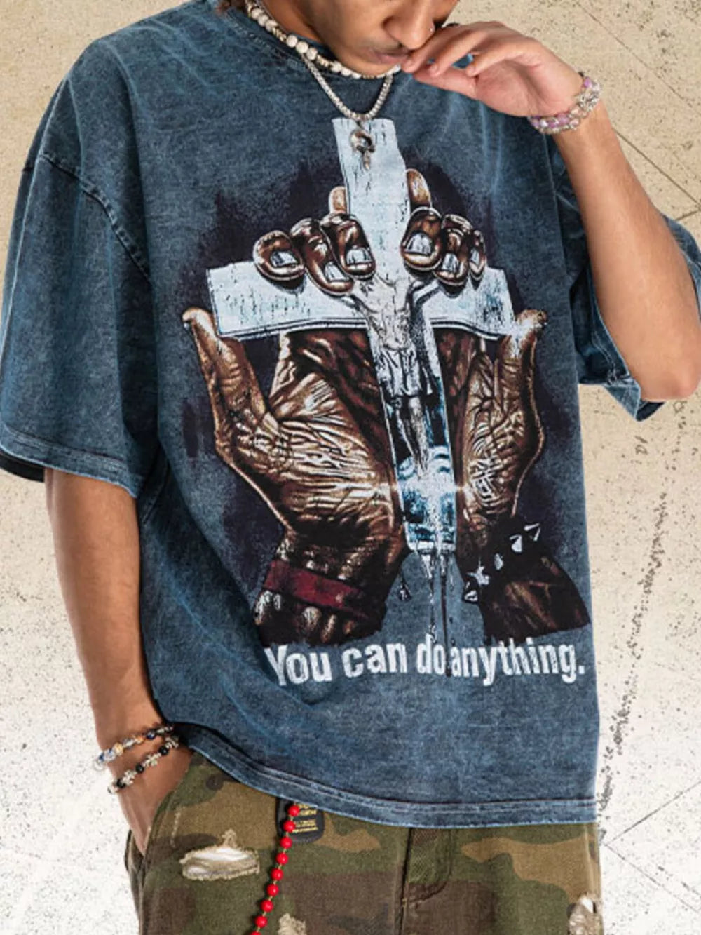 Vintage-inspired graphic t-shirt in acid-wash silver gray with crew neck and short sleeves.