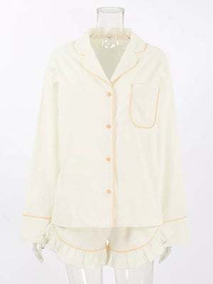 pajama set in Beige with buttoned and hip-length top, mini shorts
