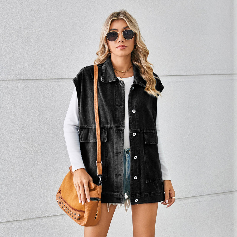 Black denim utility vest with button front and chest pockets