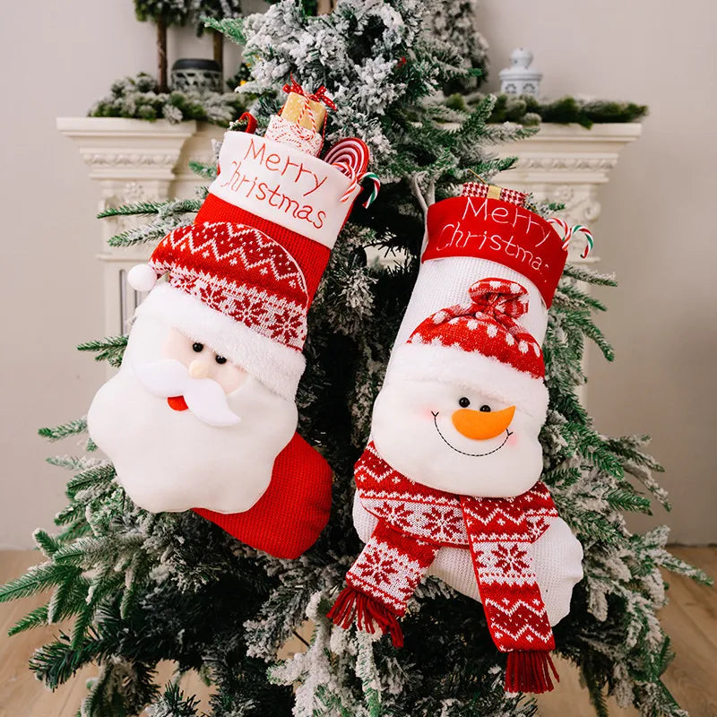 Red and white Santa and Snowman Christmas stockings with Merry Christmas text.