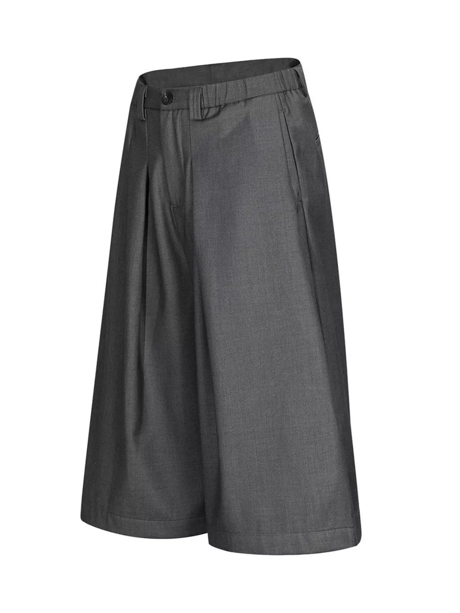 80% Polyester, 20% Viscose Care instructions: Machine wash cold capri pants in Black with wide-leg silhouette