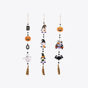 Halloween charm trio garland with pumpkins, gnomes, ghosts, bats, and car, multicolor wood beads and tassels.