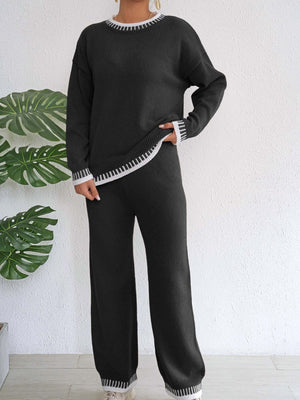 Black sweater and pants set with pullover and striped