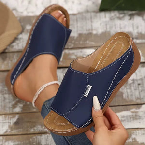 Blue casual open-toe wedge sandals with white stitching and a "Fashion" label.