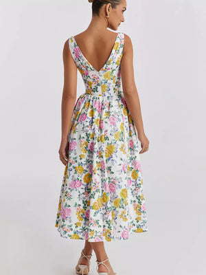 Floral print midi dress with V-neck and a-line skirt in white with pink and yellow roses.