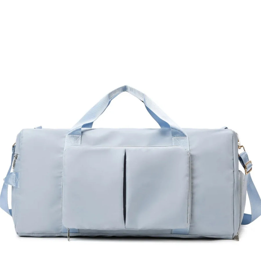 Light Blue Sport Luxe Weekend Holdall duffel bag with front pockets and adjustable strap.