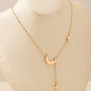 necklace in Gold with moon charm and choker
