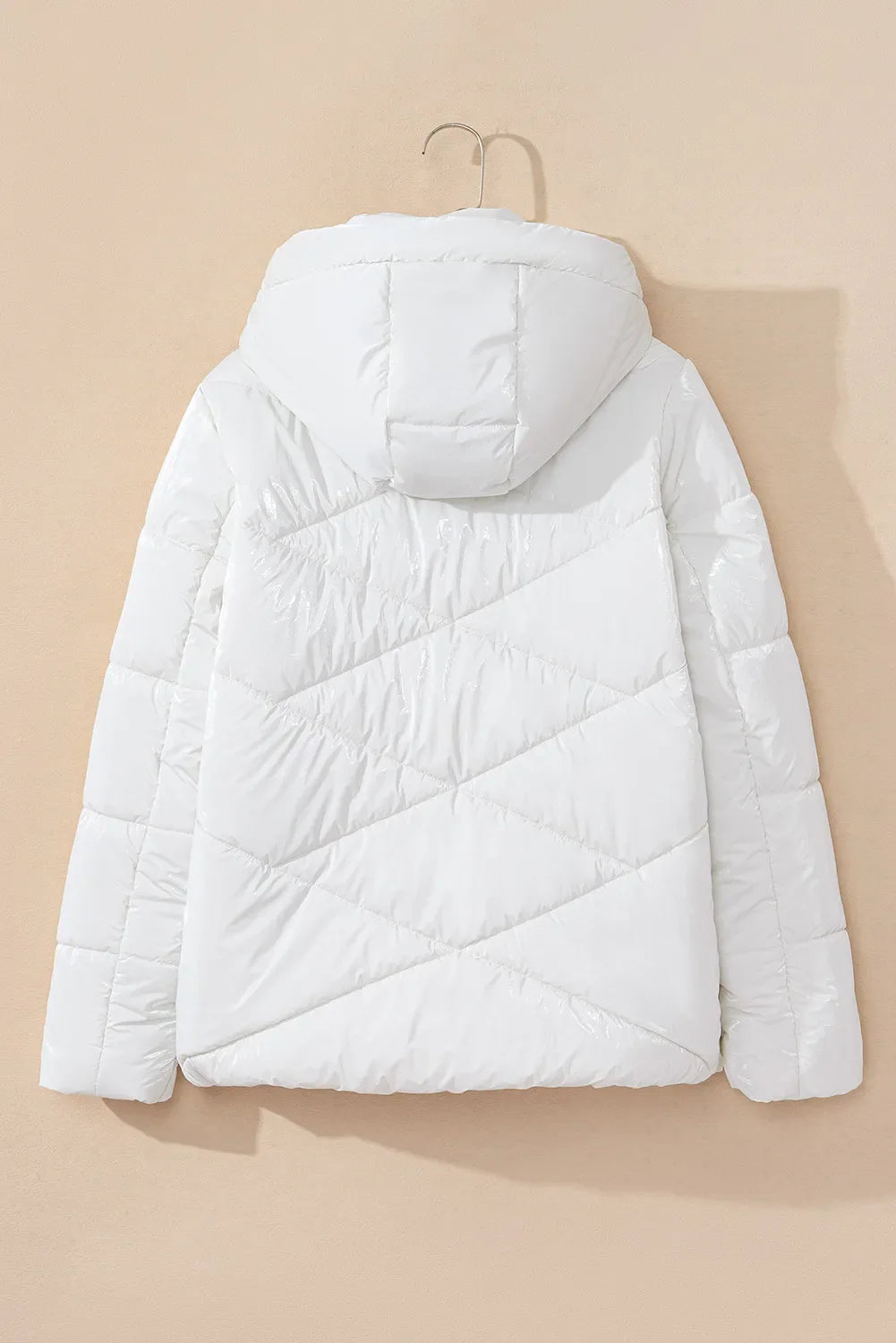 White glossy quilted hooded puffer jacket with diamond stitching detail.