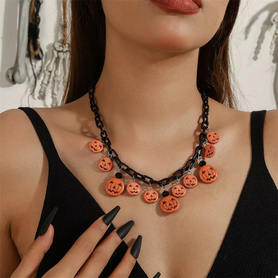 necklace in black with novelty and charm details
