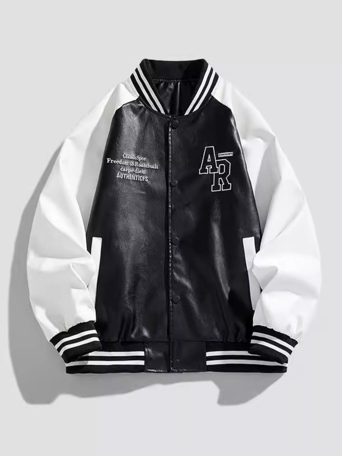 Men's black and white varsity jacket with snap buttons and striped trim