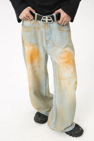 Acid wash palazzo denim jeans in light blue with orange accents, wide leg.