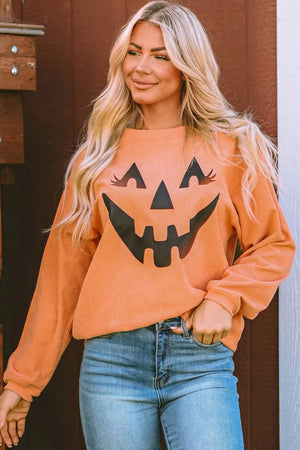 Caramel corduroy sweatshirt with jack-o'-lantern graphic and long sleeves.