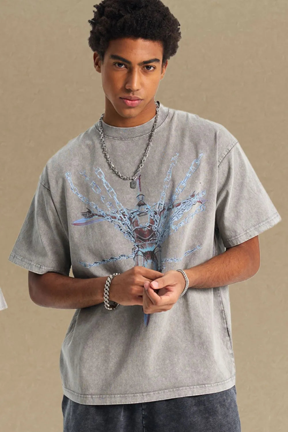 Acid wash graphic tee in gray with oversized fit and chain graphic.