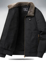 Black men's bomber jacket with plush sherpa lining and collar detail.