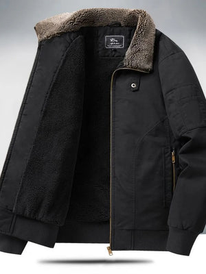 Black men's bomber jacket with plush sherpa lining and collar detail.
