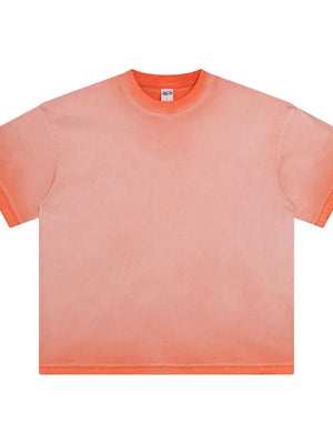 Pigment-dyed oversized tee in Burnt Coral with a faded effect, crew neck, and short sleeves.