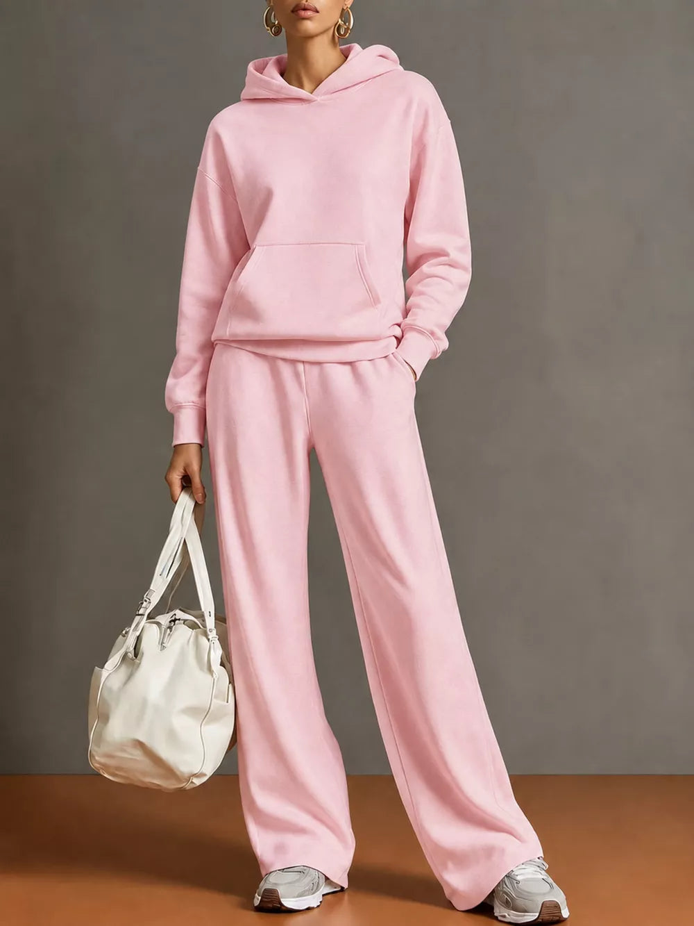lounge set in light pink featuring drawstring and relaxed fit