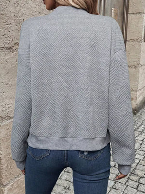 bomber jacket in Black with geometric and ribbed