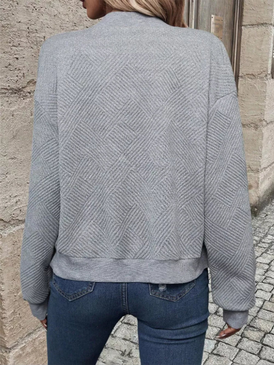bomber jacket in Black with geometric and ribbed
