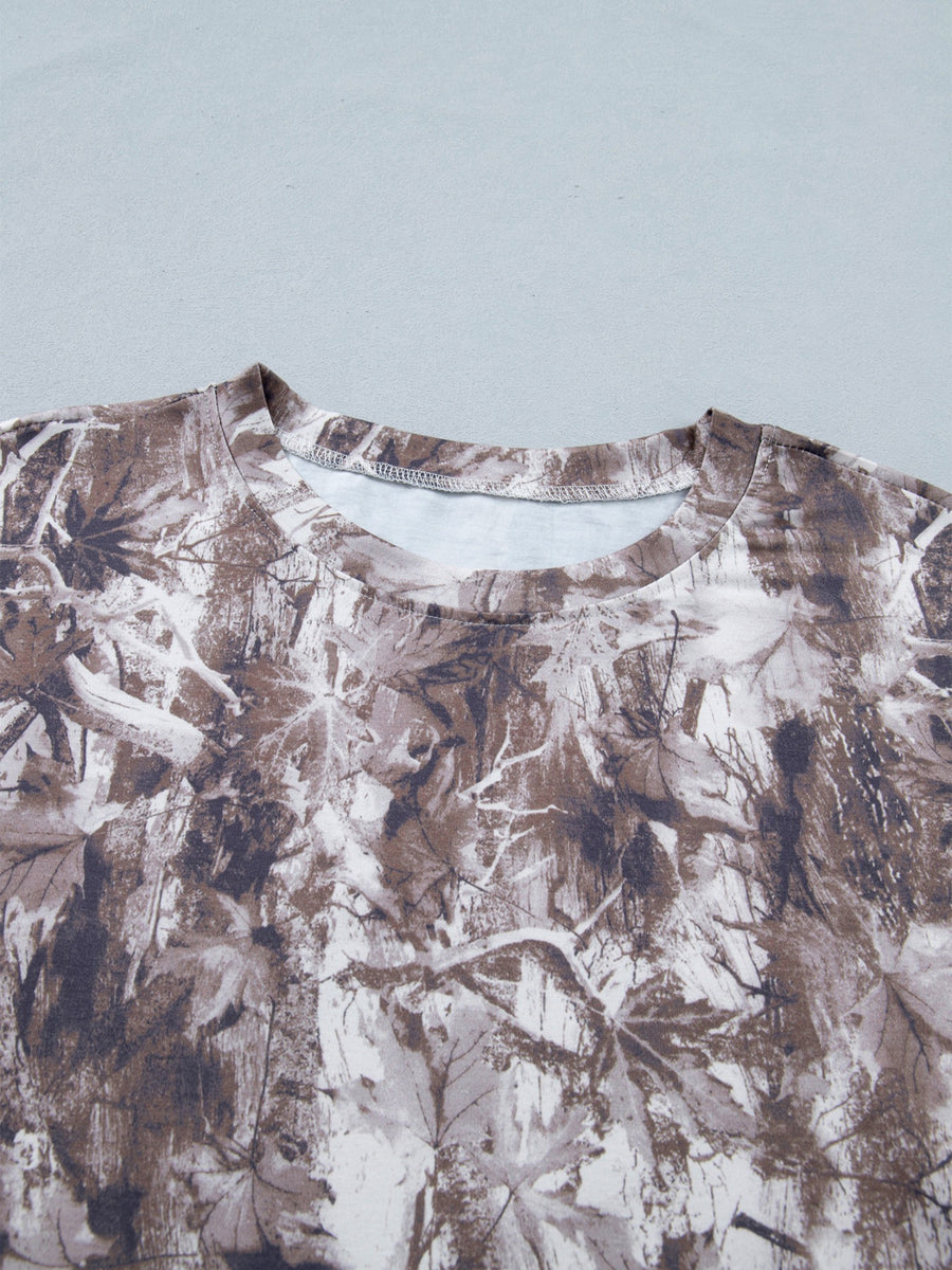 Woodland camouflage tunic with crew neck and drop shoulders.