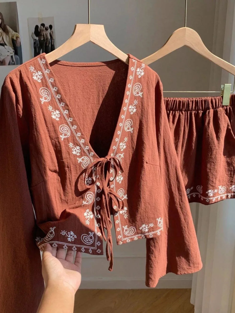 Brown embroidered tie-front top and shorts set with paisley pattern.
