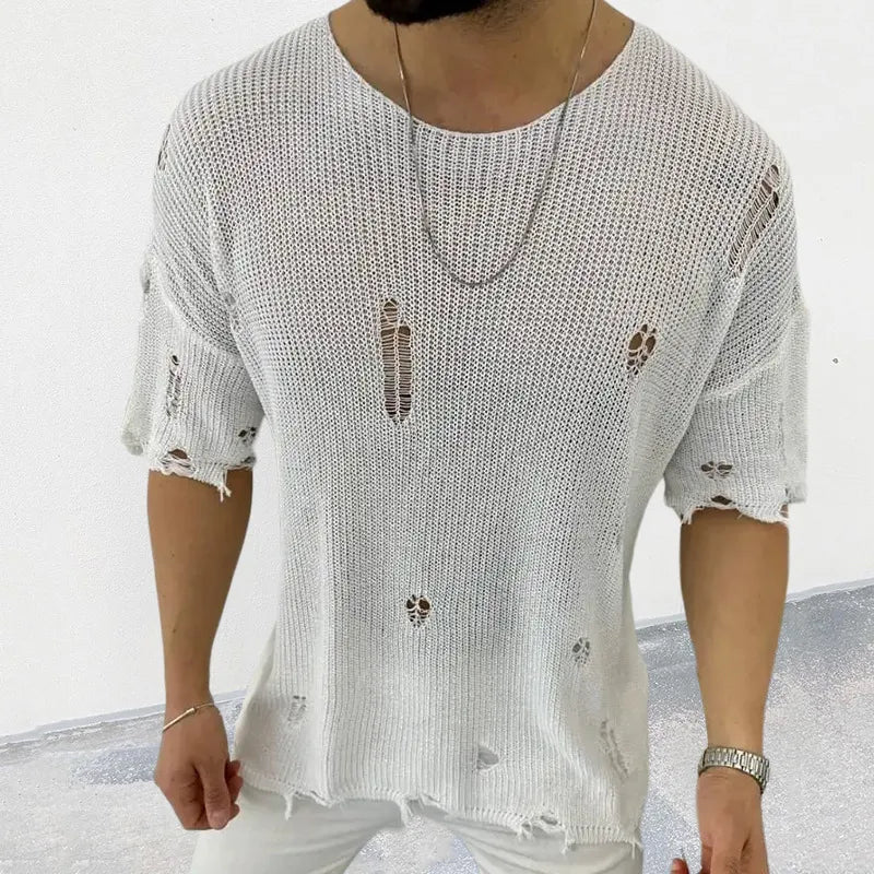 Ivory open-knit destroyed crewneck tee with short sleeves and raw hem.