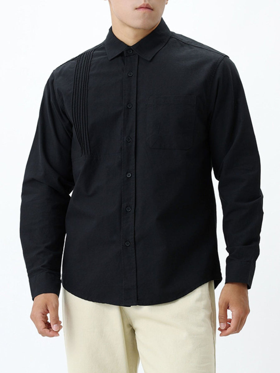 Black button-up shirt with hip-length and button-front