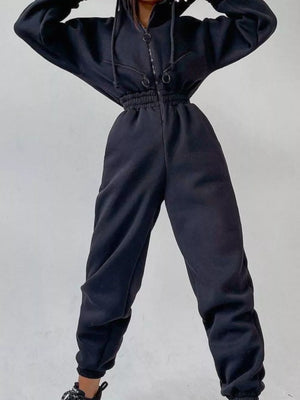 White jumpsuit with full-length and zip-front