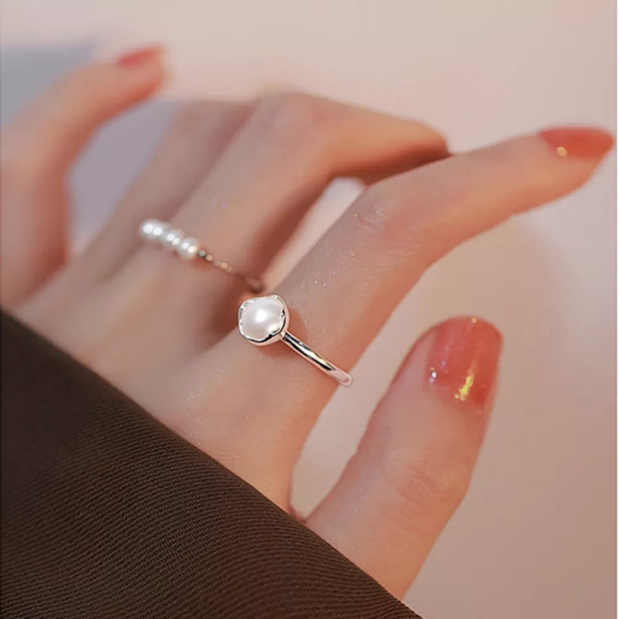 Freshwater Pearl,925 sterling silver Care instructions: Avoid wearing during exe ring in ivory with n/a silhouette