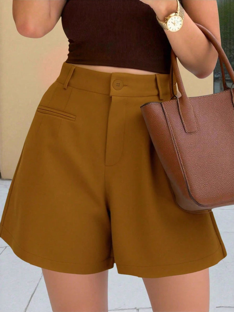 Brown pleated high-waisted shorts with button closure and pocket detail.