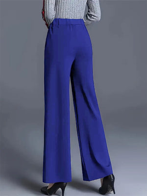 Blue high-waisted wide leg cotton trousers with pockets, elegant and comfortable.