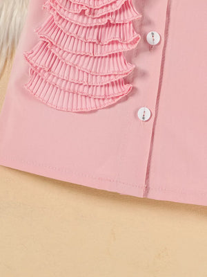 Pink toddler outfit with ruffled floral appliqué and decorative buttons