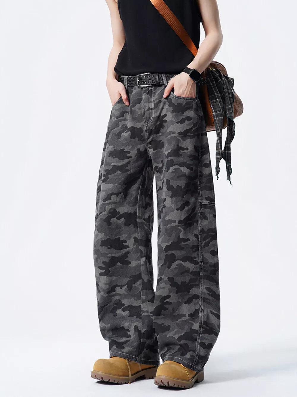 Men's relaxed fit dark grey camouflage cargo pants with multiple pockets.