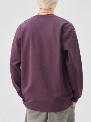 Casual oversized long-sleeve sweatshirt in Sauce Purple, crewneck, relaxed fit.