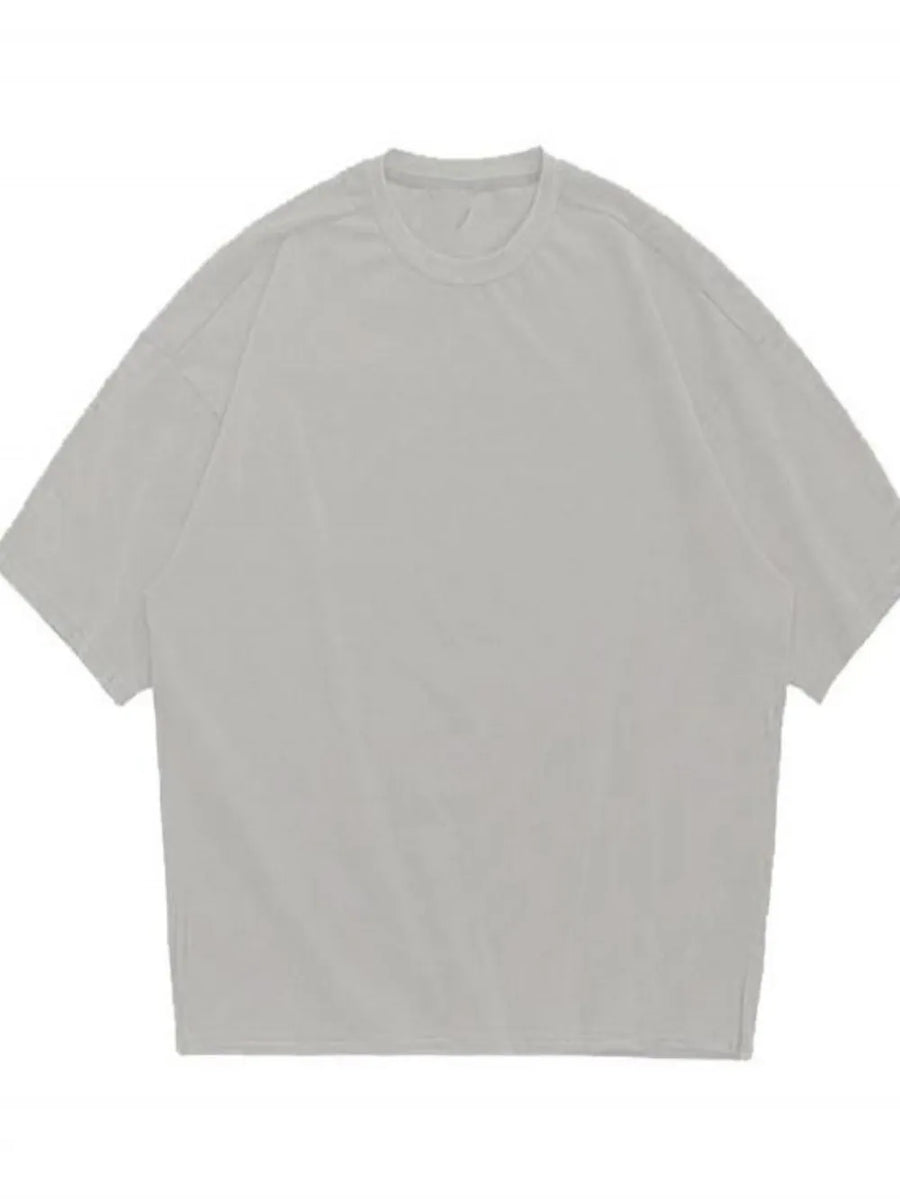 Oversized gray crew neck t-shirt with textured fabric and short sleeves.