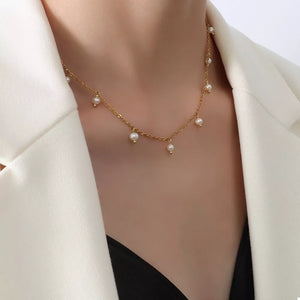 Freshwater Pearl, 18K Gold-Plated, Titanium Steel Care instructions: Imported Si necklace in Gold with fitted silhouette